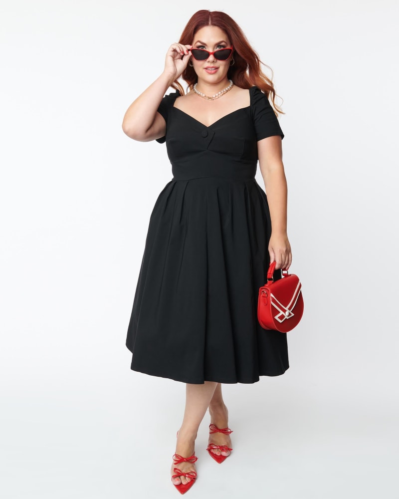 Front of a model wearing a size 1X/16 Unique Vintage Plus Size Black Sweetheart Midge Swing Dress in Black by Unique Vintage. | dia_product_style_image_id:269610